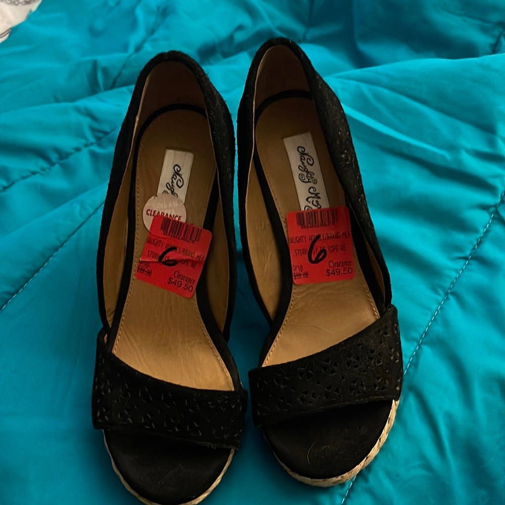 Never worn wedges, size 6